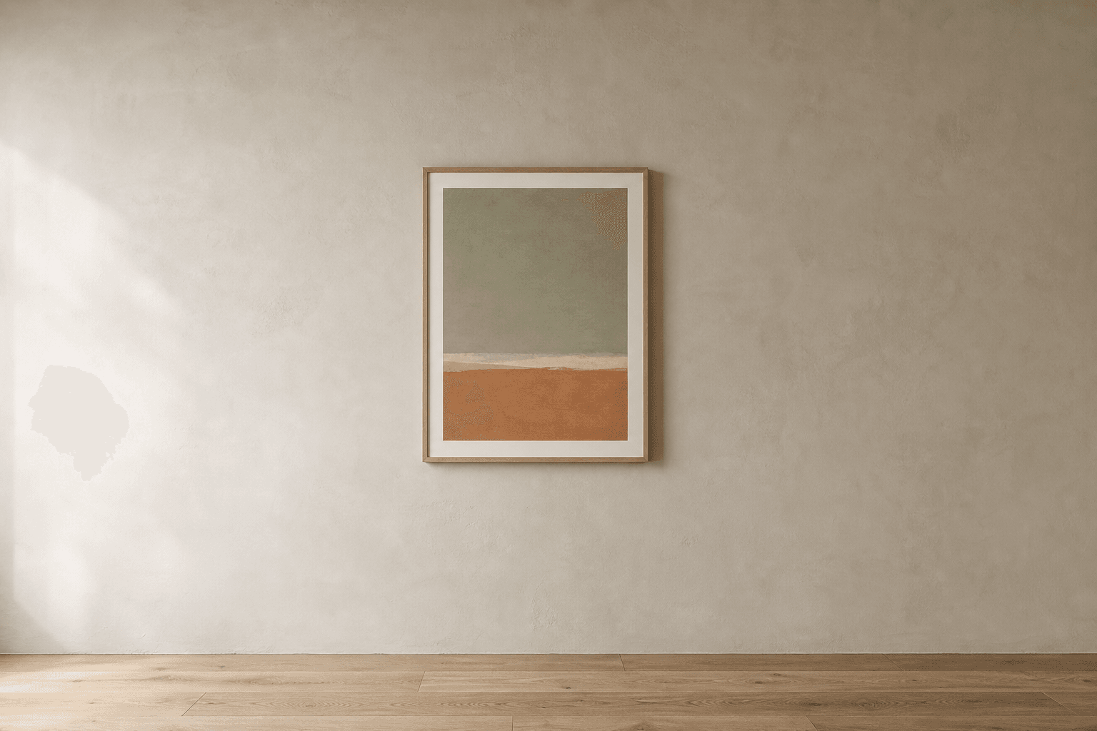 One framed piece in muted sage and clay, hanging alone on a pale plaster wall in daylight