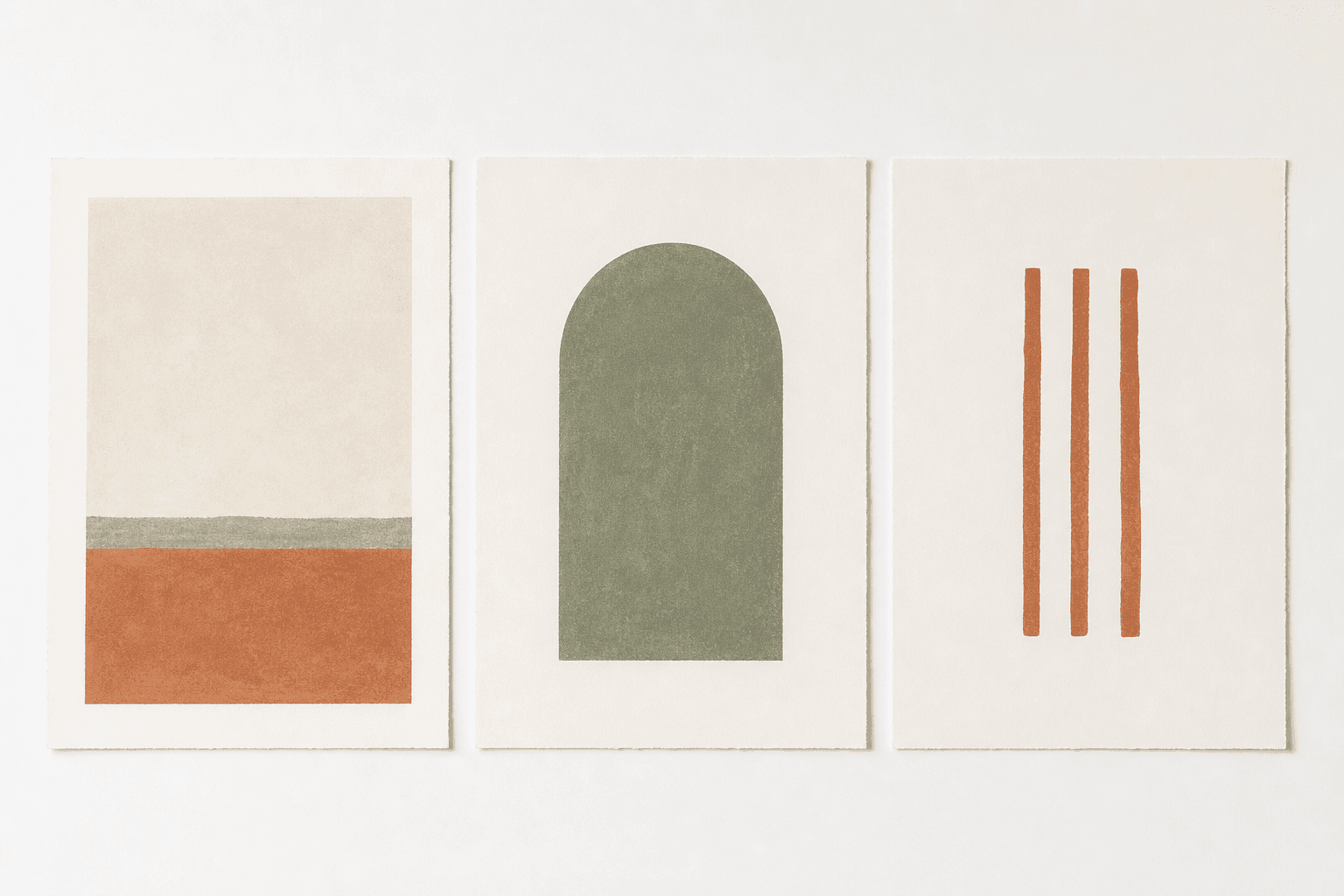 Three coordinated print sheets in sage, clay and warm white, laid flat side by side